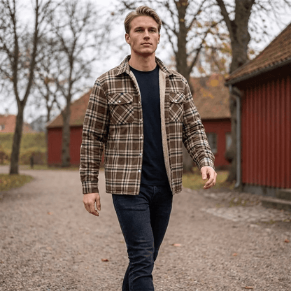 Ternet vinterjakke foret med blød teddyfleece og klaplommer på brystet