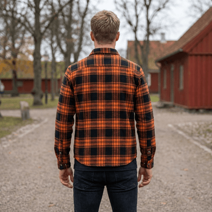 Ternet vinterjakke foret med blød teddyfleece og klaplommer på brystet
