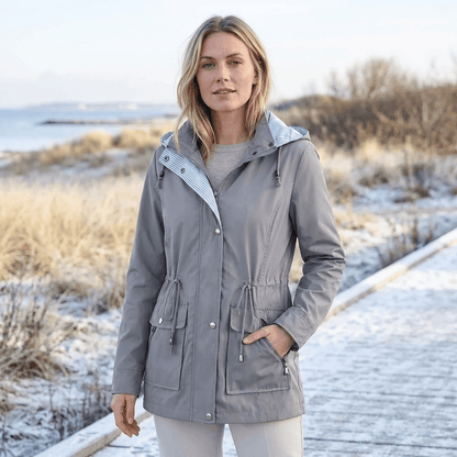 Lang vandtæt vintertrenchcoat med hætte og justerbar talje