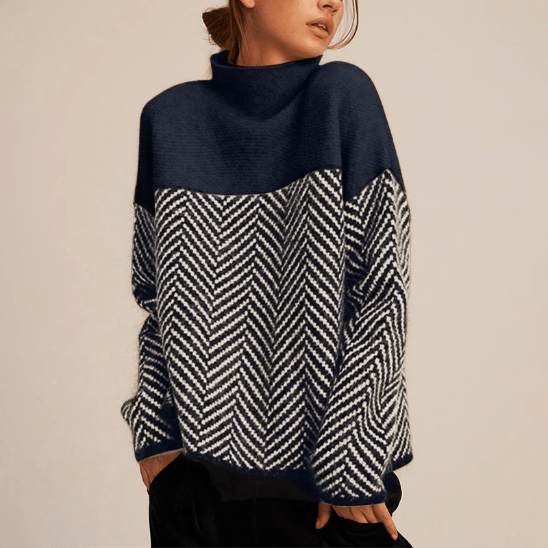 Noelle rullekravetrøje i faux cashmere med sildebensmønster og løs pasform