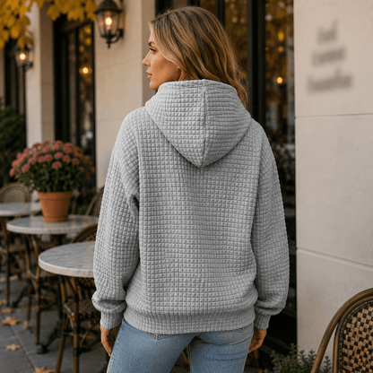 Struktureret hoodie med justerbar hætte og rummelig kængurulomme